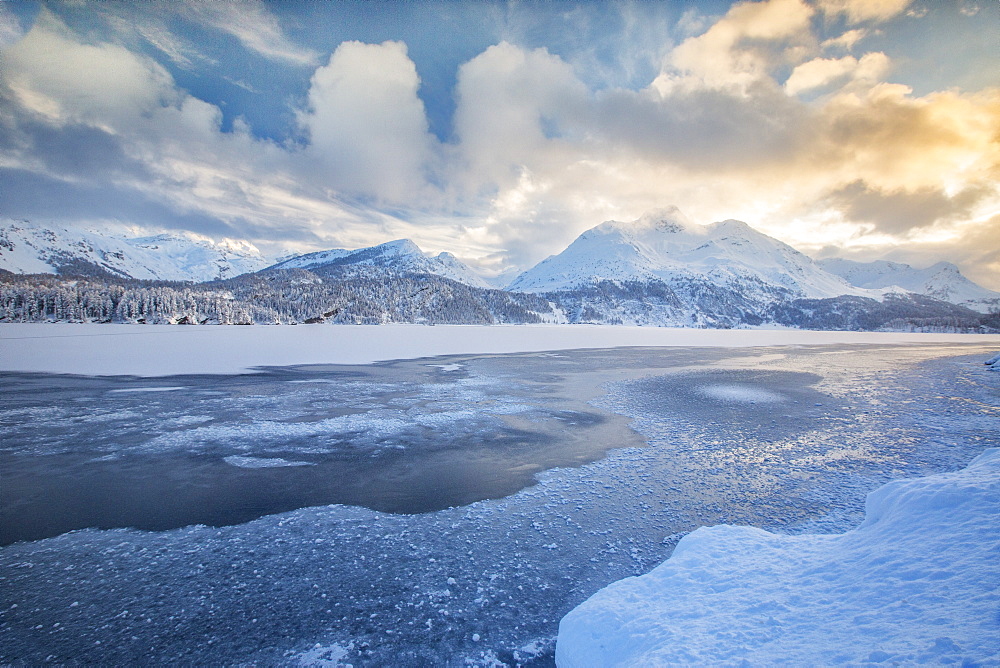 The shore of the frozen Lake Sils, Upper Engadine, Canton of Grisons (Graubunden), Switzerland, Europe