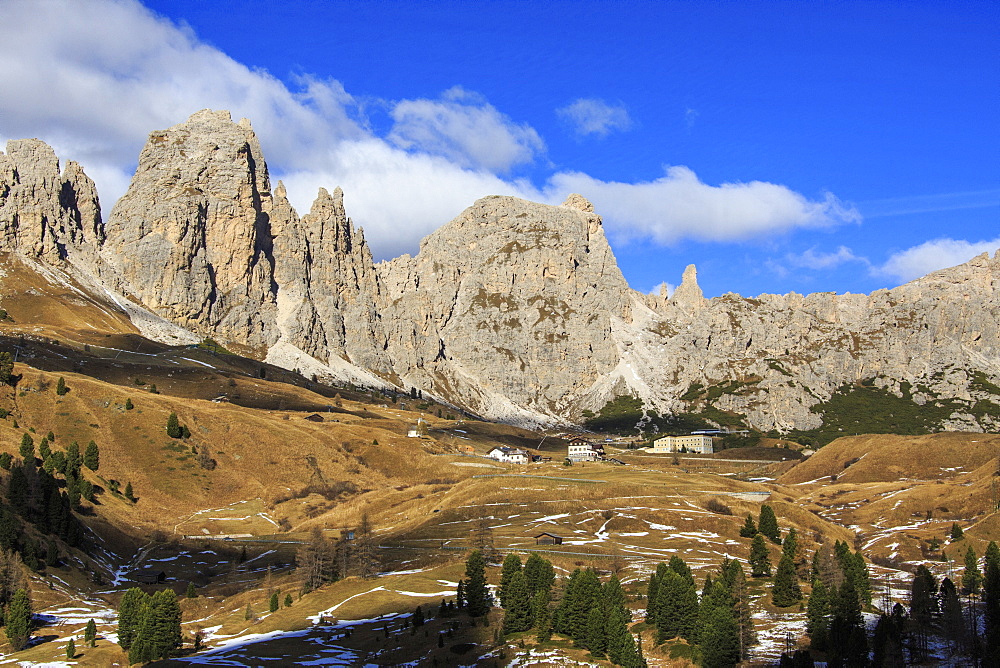 Blue sky on the rocky peaks and typical autumn landscape at Gardena Pass, South Tyrol, Trentino-Alto Adige, Italy, Europe