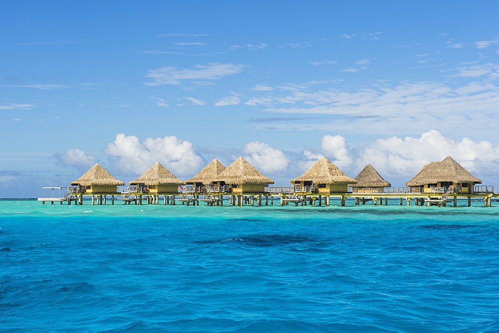 Overwater bungalows in luxury hotel in Bora Bora, Society Islands, French Polynesia, Pacific