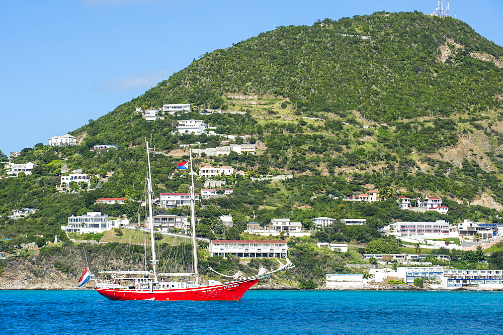 Red sailing boat in the bay of Philipsburg, Sint Maarten, West Indies, Caribbean, Central America