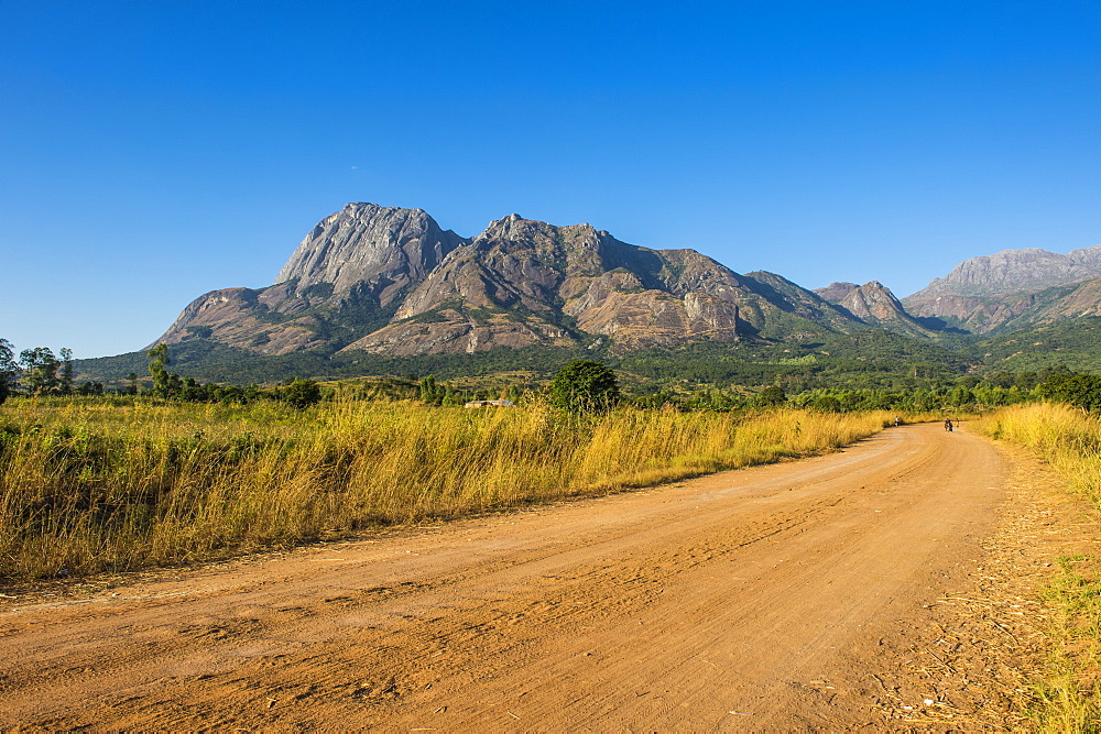 Road leading to the granite peaks of Mount Mulanje, Malawi, Africa