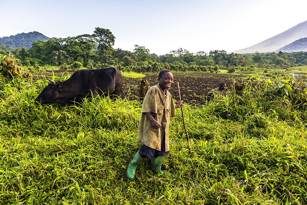 Happy young farming boy, Virunga National Park, Democratic Republic of the Congo, Africa