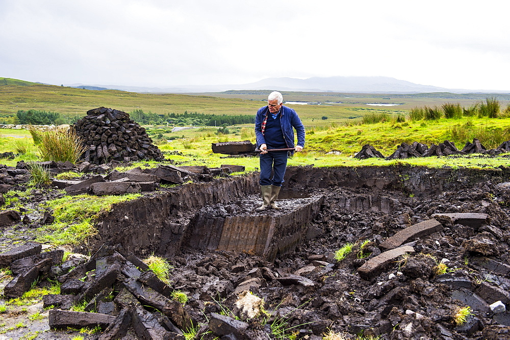 Blocks of peat cut out on a traditional farm, Connemara National Park, County Galway, Connacht, Republic of Ireland, Europe