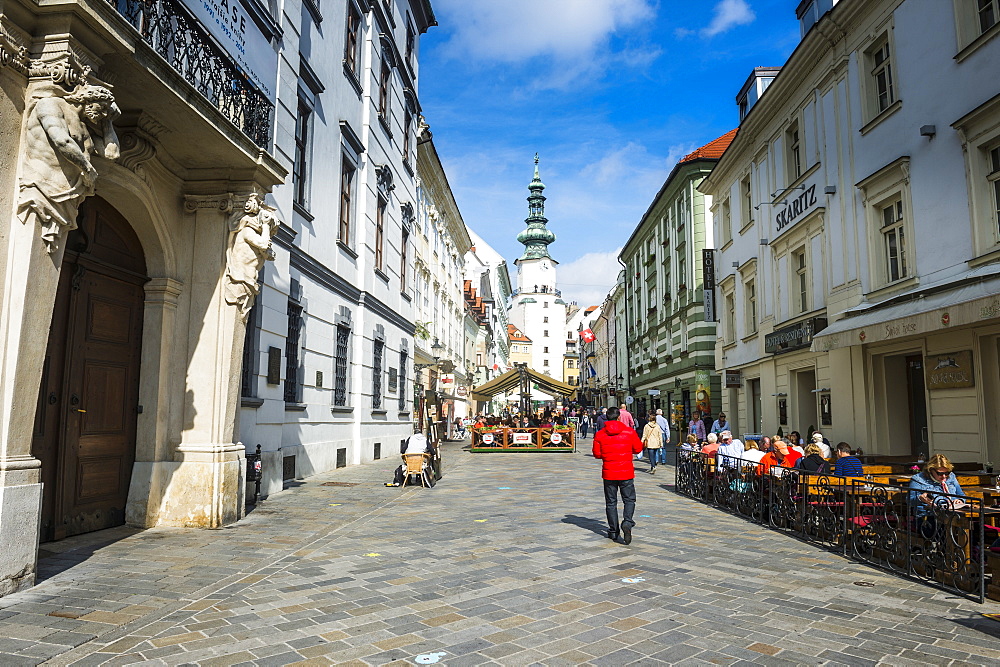 Pedestrian zone in the centre of Bratislava with Michael's Gate in the background, Bratislava, Slovakia, Europe