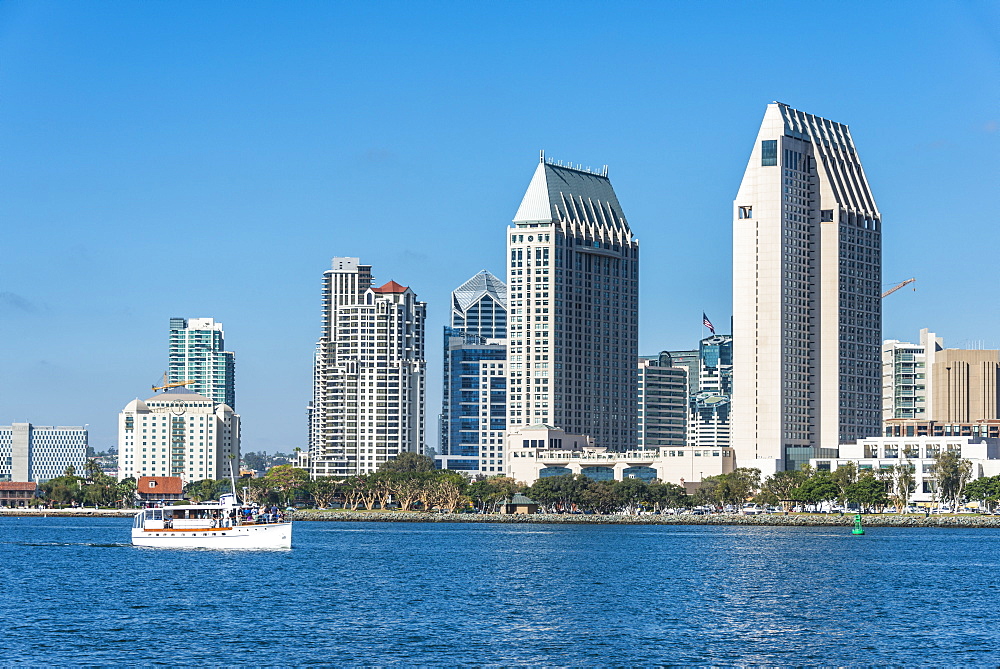 Little tourist cruise ship with the skyline in the background, Harbour of San Diego, California, United States of America, North America