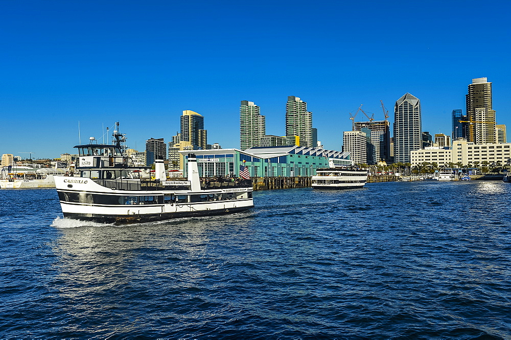 Little tourist cruise ship with the skyline in the background, Harbour of San Diego, California, United States of America, North America