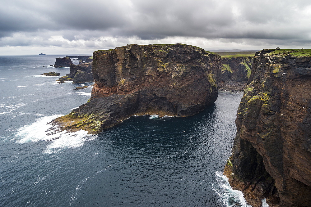 The dramatic cliffs under the Eshaness Lighthouse, Shetland Islands, Scotland, United Kingdom, Europe