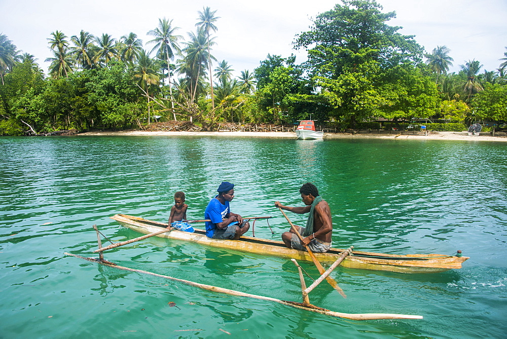 Locals in a dugout canoe, Kavieng, New Ireland, Papua New Guinea, Pacific