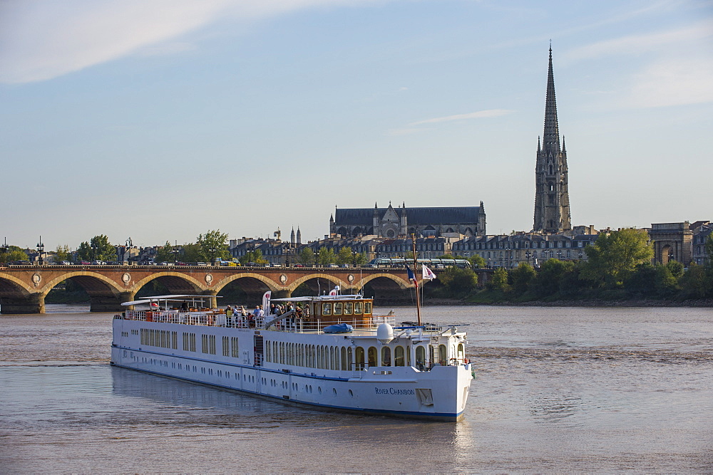 Cruise sailing in front of the skyline of Bordeaux, Aquitaine, France, Europe