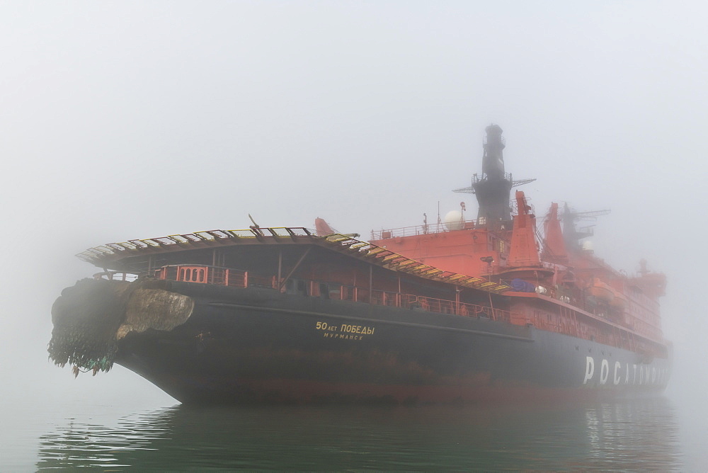 Icebreaker in the fog anchoring in Tikhaya bay on Hooker island, Franz Josef Land archipelago, Arkhangelsk Oblast, Arctic, Russia, Europe