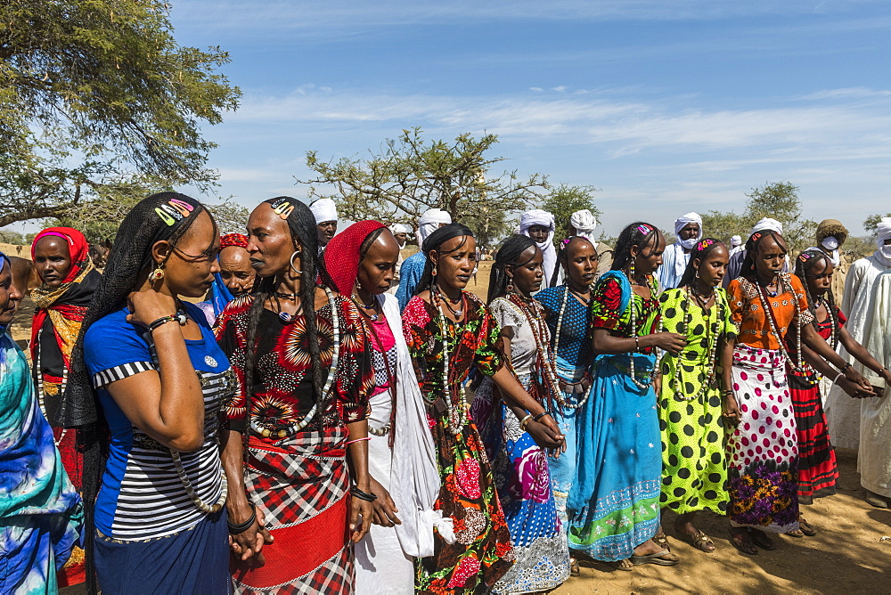 Colourful dressed women at a tribal festival, Sahel, Chad, Africa