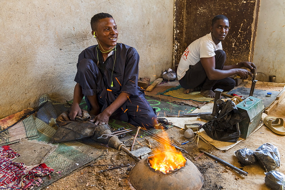 Man working on Jewllery in the UNESCO World Heritage Site, Agadez, Niger, West Africa, Africa