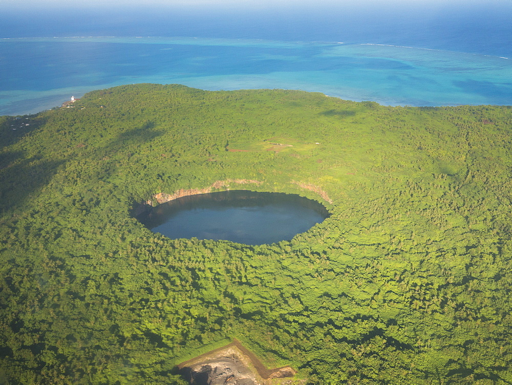 Aerial of Lalolalo lake volcanic crater lake, center of Wallis, Wallis and Futuna, South Pacific, Pacific