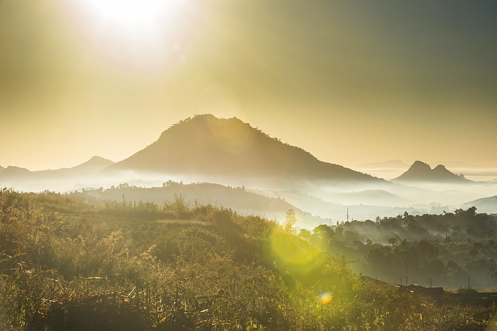 Sunrise and fog over the mountains surrounding Blantyre, Malawi, Africa