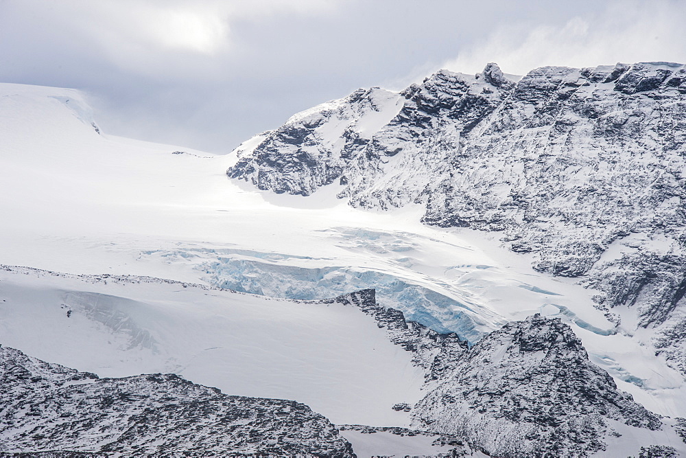 Glacier flowing down a mountain on Elephant Island, South Shetland Islands, Antarctica, Polar Regions