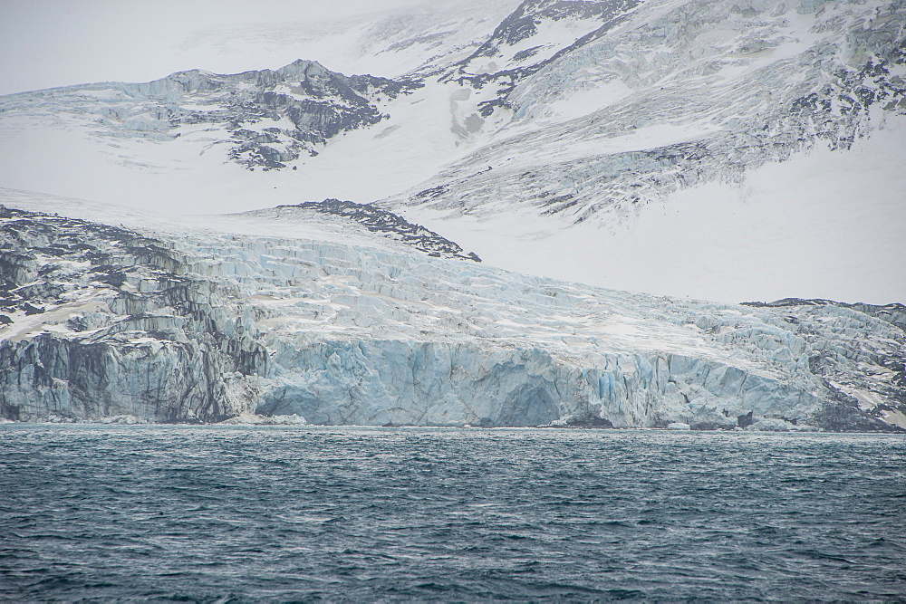 Glacier flowing down a mountain on Elephant Island, South Shetland Islands, Antarctica, Polar Regions