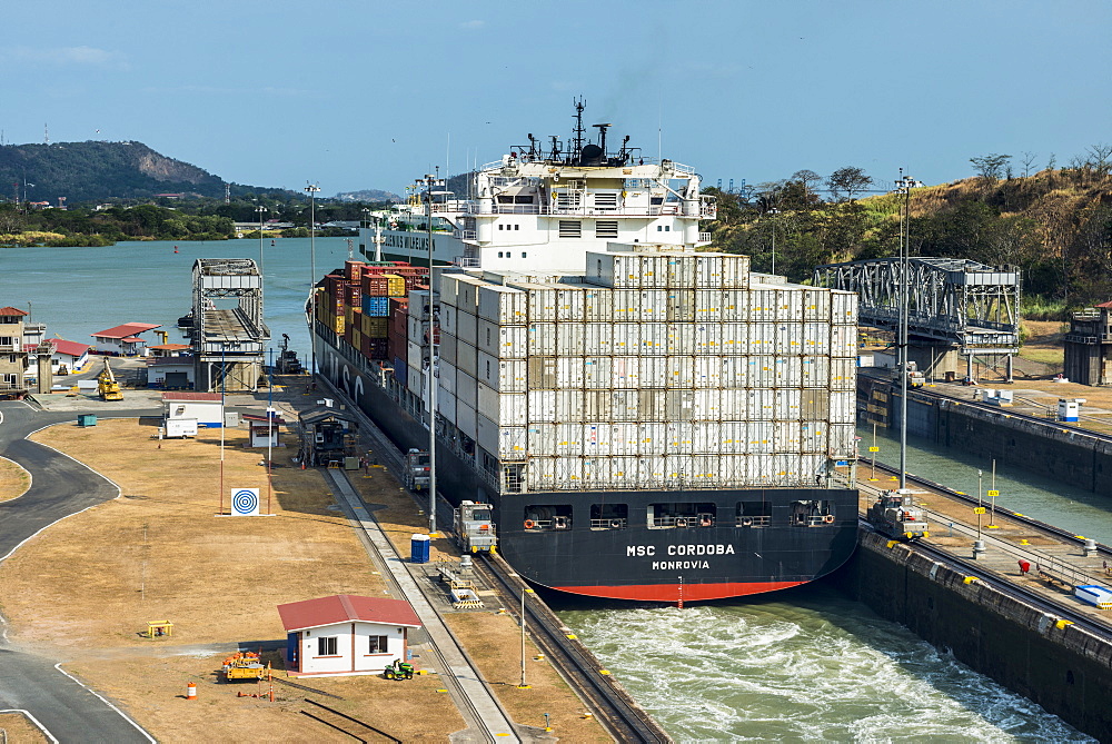 Cargo boat passing the Miraflores Locks, Panama Canal, Panama City, Panama, Central America