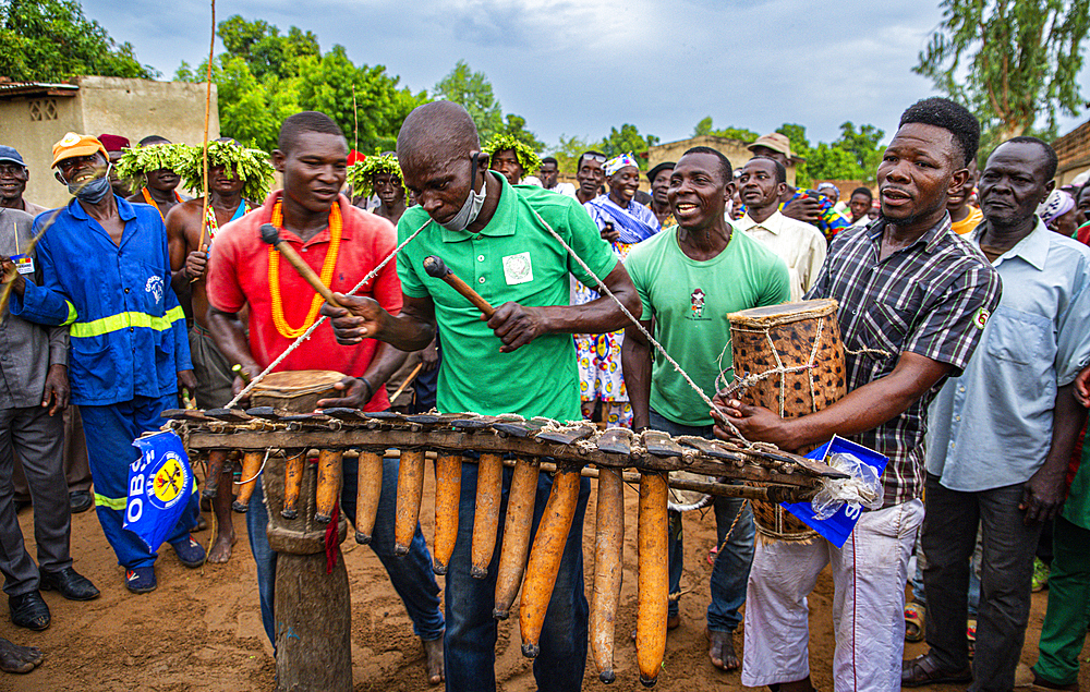 Men playing traditional instruments at a tribal festival, Southern Chad, Africa