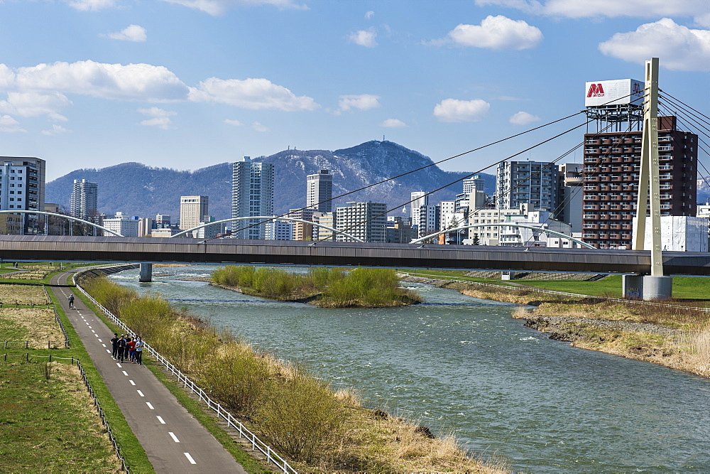 Massive bridge spanning the Ishikari River flowing through Sapporo, Hokkaido, Japan, Asia