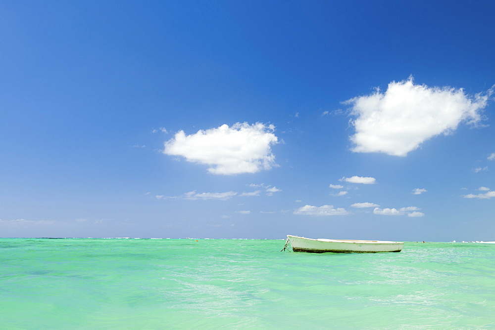 Fishing boat on the turquoise waters, Le Morne, Black River, Mauritius, Indian Ocean, Africa