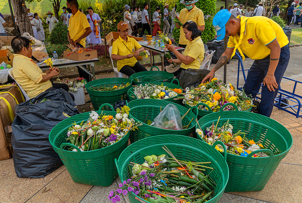 Devotees attending the Makha Bucha Buddhist celebrations where relics of Buddha are enshrined at the Royal Park Rajapruek, Chiang Mai, Thailand, Southeast Asia, Asia