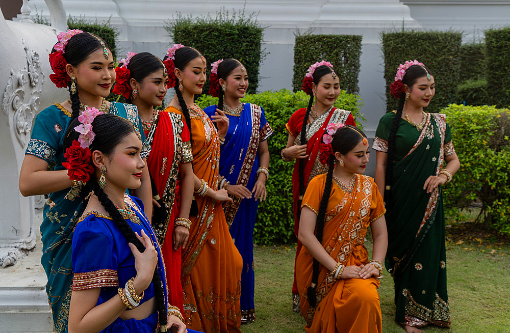 Thai classical dancers and musicians at Makha Bucha Buddhist celebrations where relics of Buddha are enshrined at the Royal Park Rajapruek, Chiang Mai, Thailand, Southeast Asia, Asia