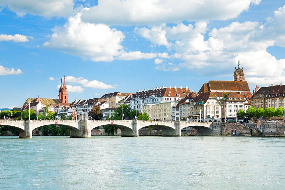 Old town of Basel with the cathedral of Basel, the Martins church and the bridge ???Mittleren Brv?cke??? crossing the river Rhein