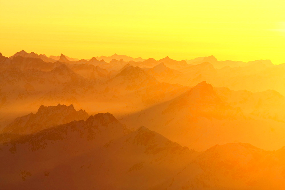 German alps, on the top of zugspitze in winter, silhouettes, bayern, germany