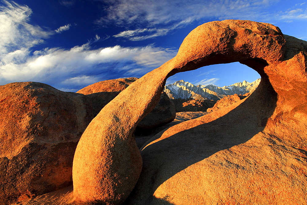 Mobius arch, natural arch formed out of granit rock at sunrise, lone pine peak, 12994, feet, mt. whitney, 14497, feet, highest peak of lower 48, alabama hills, sierra nevada, lone pine, california, usa