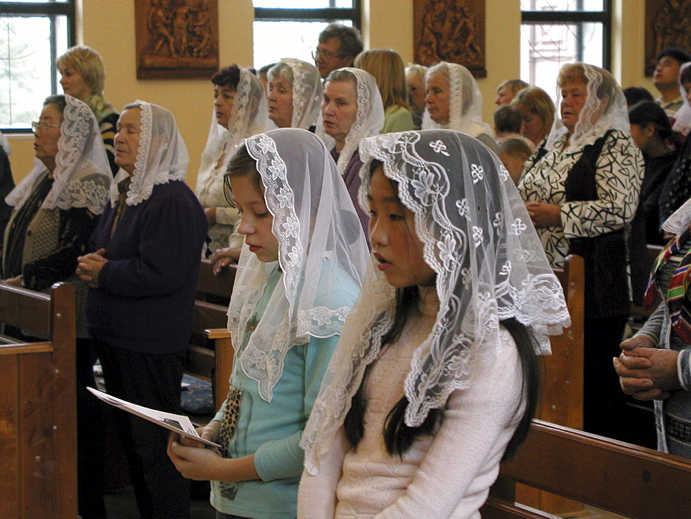 Russia - sunday mass at catholic church, yuzhno sakhalinsk, sakhalin island, russian far east