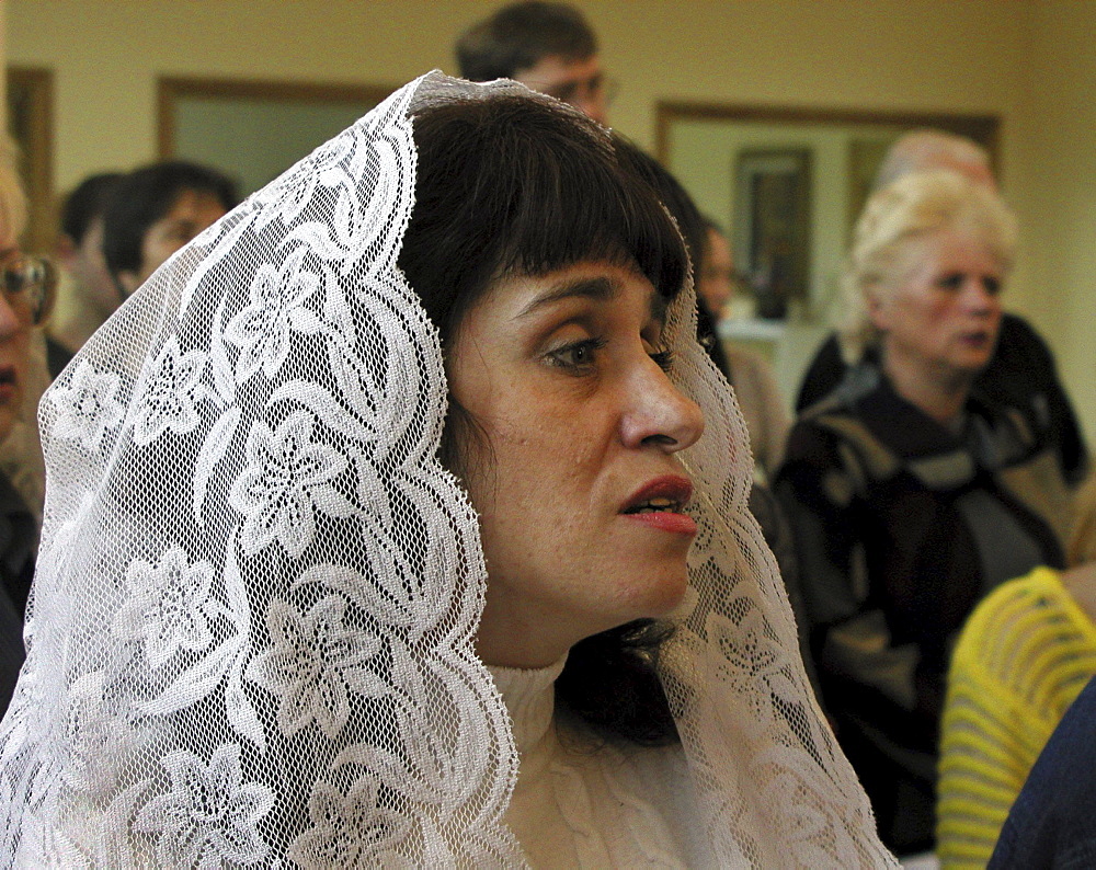 Russia - sunday mass at catholic church, yuzhno sakhalinsk, sakhalin island, russian far east