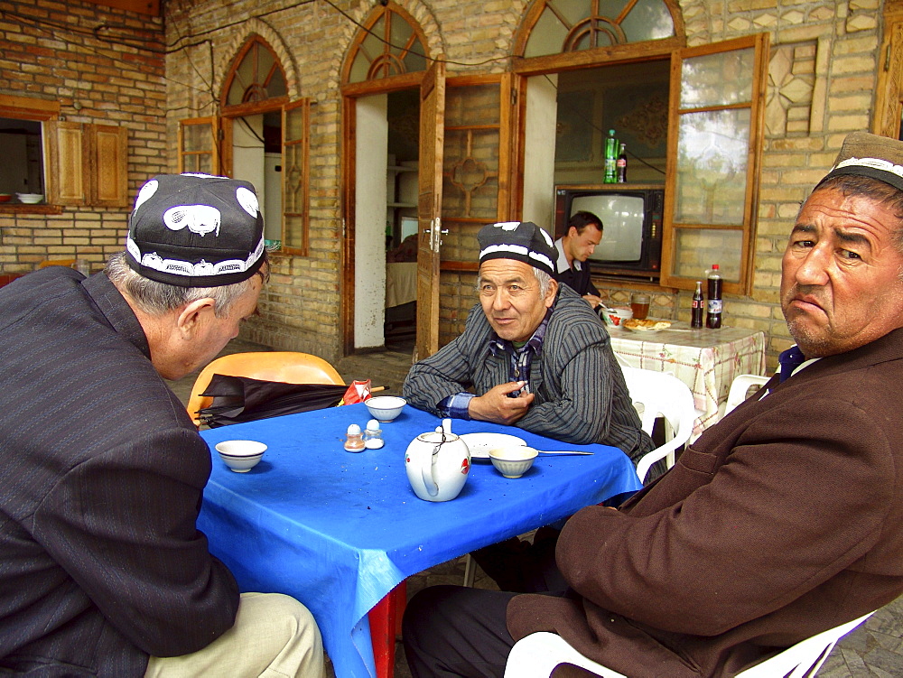 Uzbekistan men drinking tea at a chaikhana, shakhrisabz. 