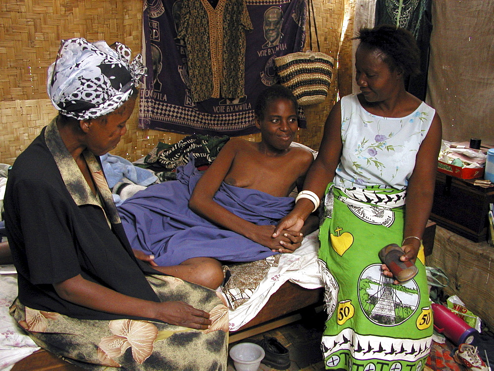 Zambia care giver visiting a woman who is hiv+, mongu