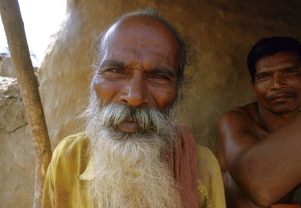 India - faces: men of orissa, victims of recent hurricane 2000