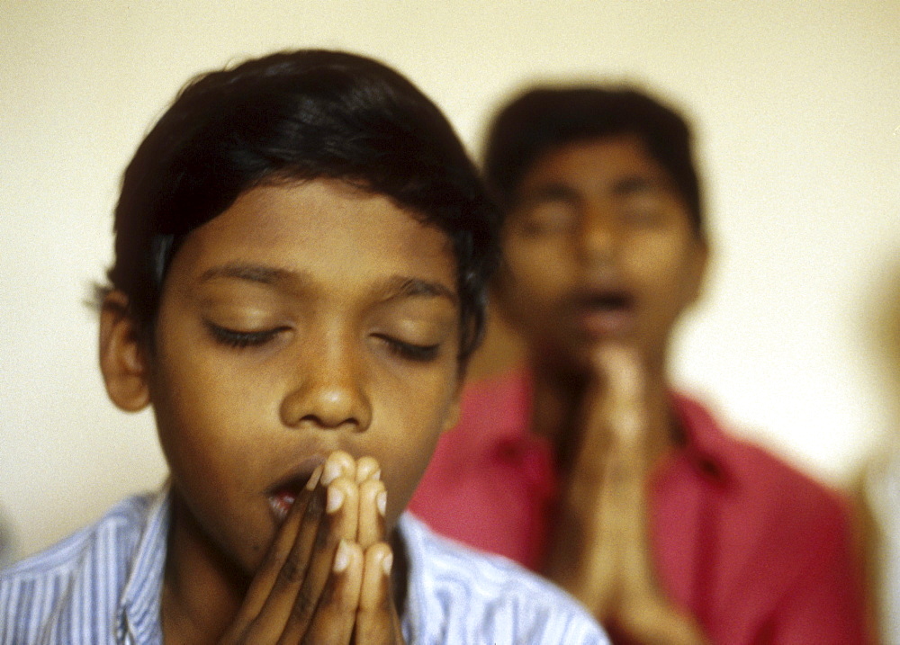 India - religion - christian boys praying, karimoor boys home, kerala