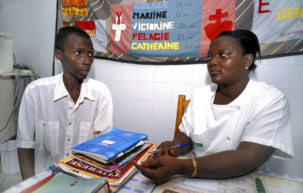 Benin atimakan vincent de, (40), hiv+ receiving counselling. I no how i caught, maybe a mosquito, i never slept anyone but my Saint camille clinic, abomey.