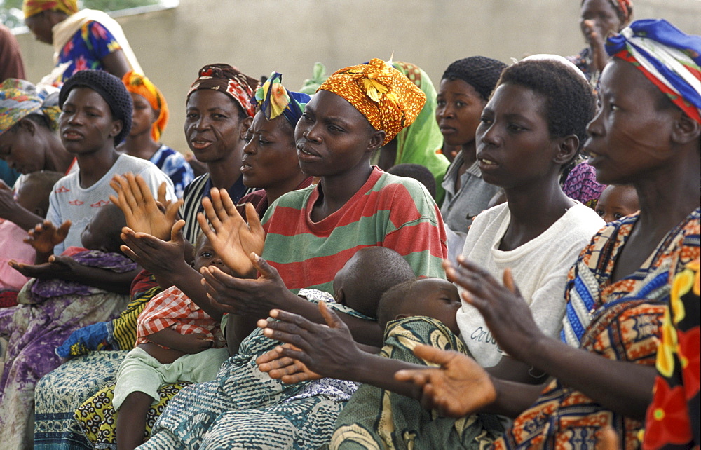 Ghana women singing at a mother/child health clinic bongo, bolgatanga