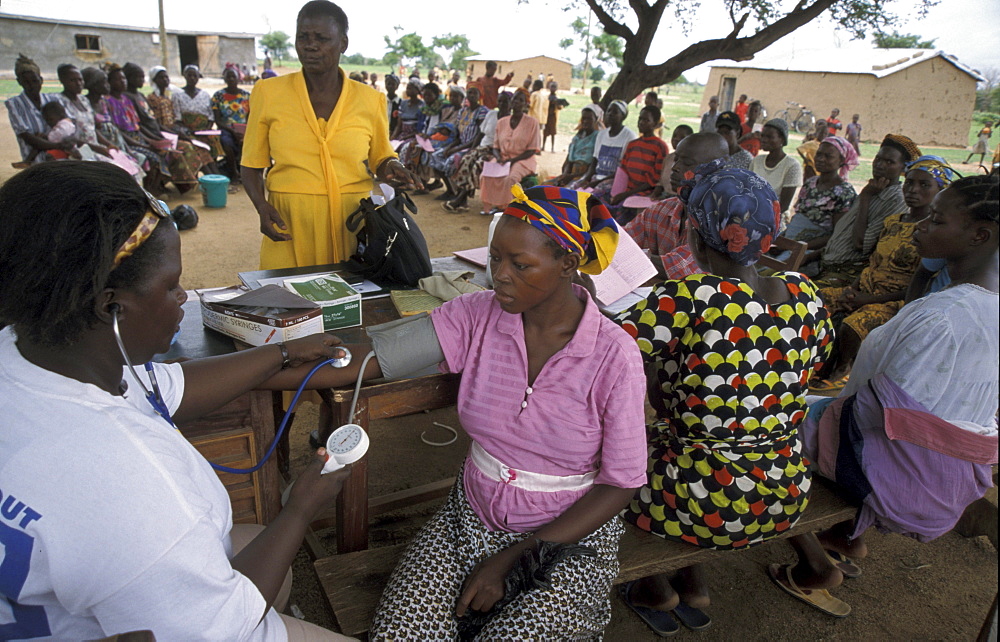 Ghana women having blood pressure checked at a mother/child health clinic bongo, bolgatanga