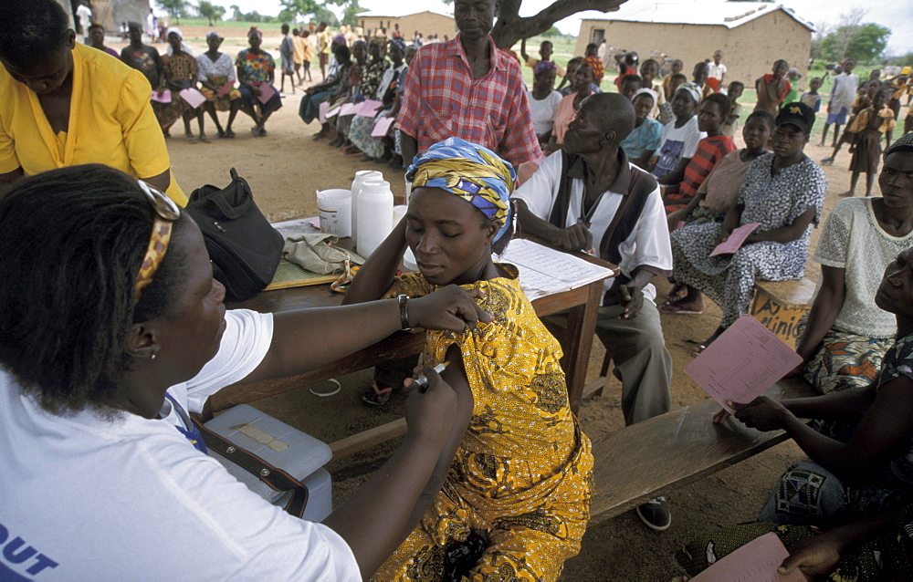 Ghana woman receiving immunisation at a mother/child health clinic bongo, bolgatanga