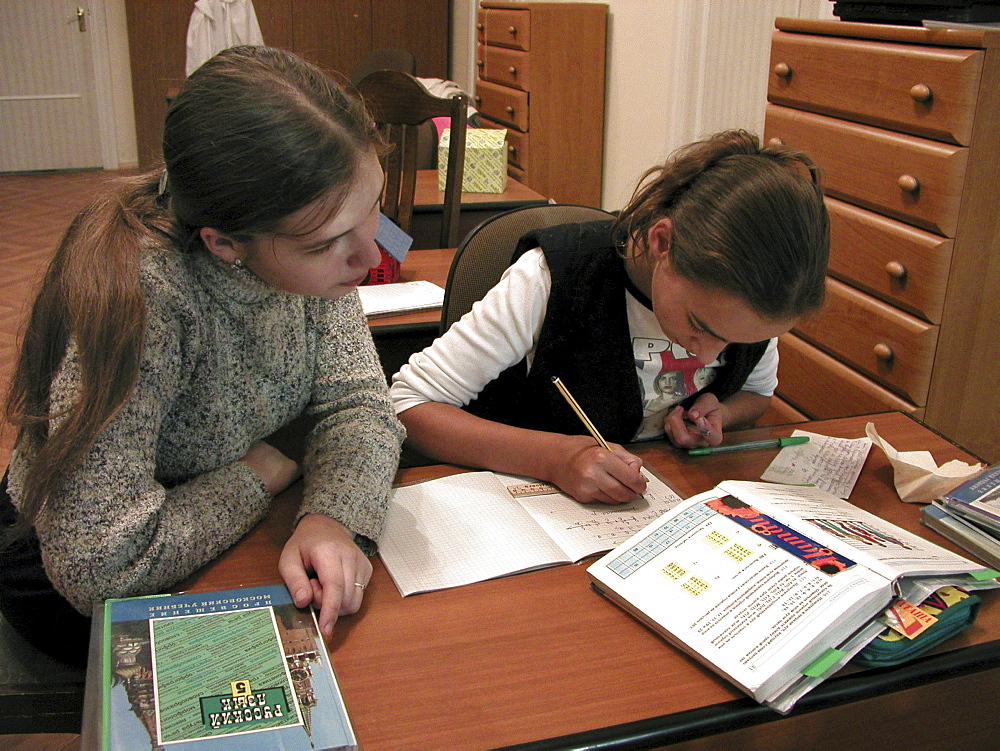 Russia orphan girls living at & martha convent moscow, doing homework