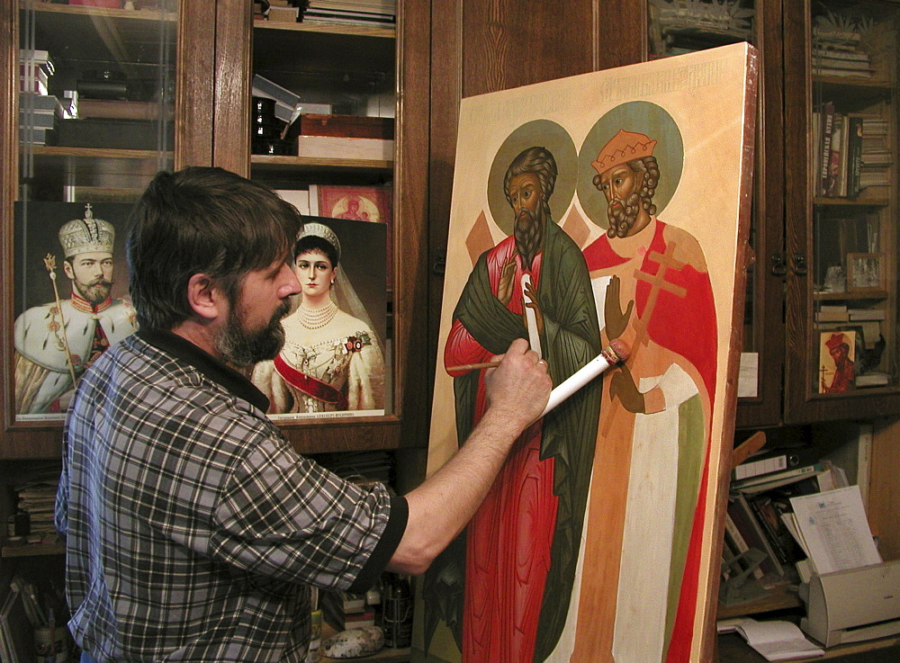 Russia painter alexander mamina working on detail for iconostasis palekh