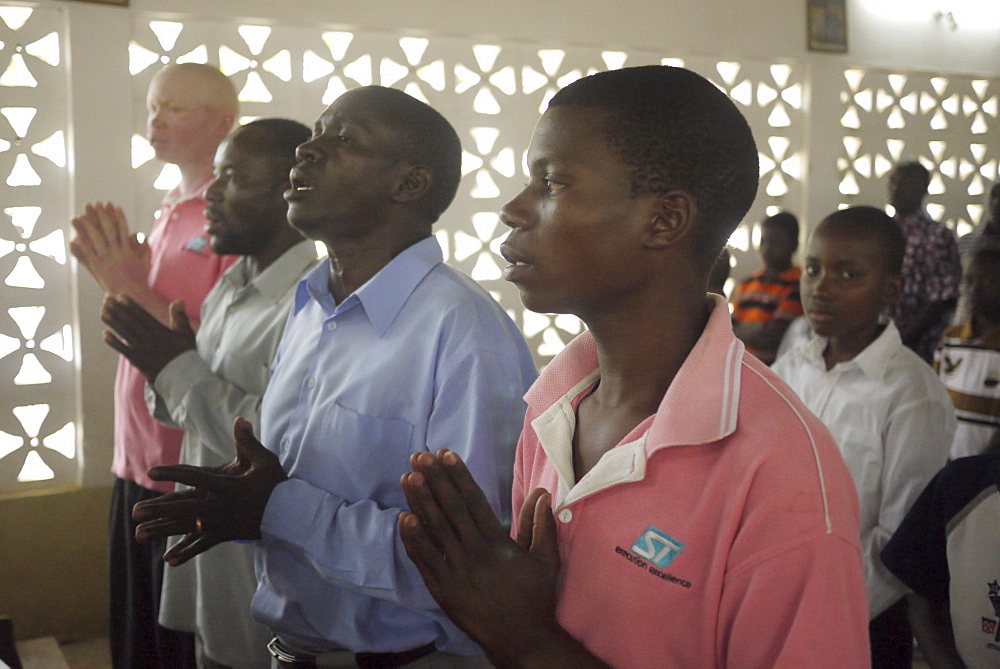 TANZANIA The Roman Catholic Parish of Buza, Dar es Salaam. Sunday mass. photograph by Sean Sprague