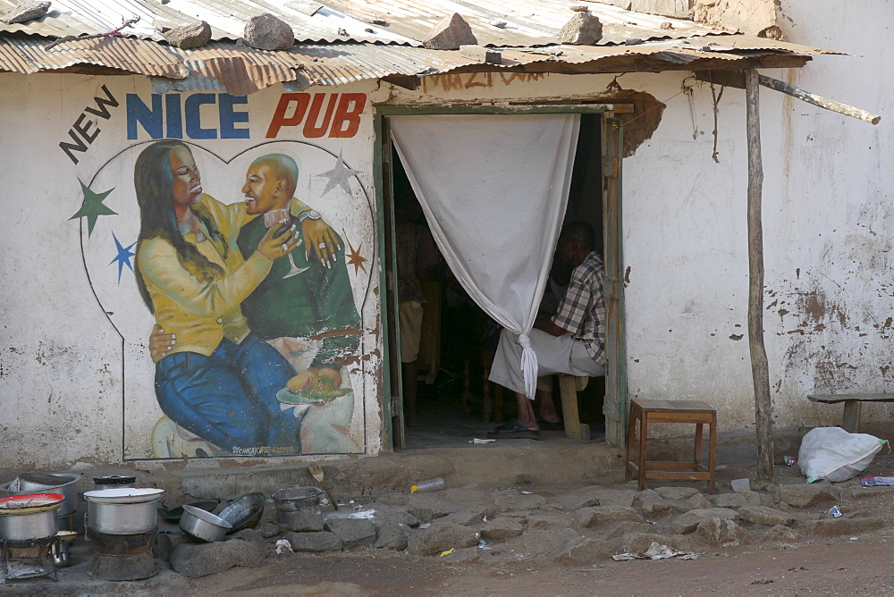 TANZANIA Street scene n Mabitini, with local bar, Mwanza. photograph by Sean Sprague