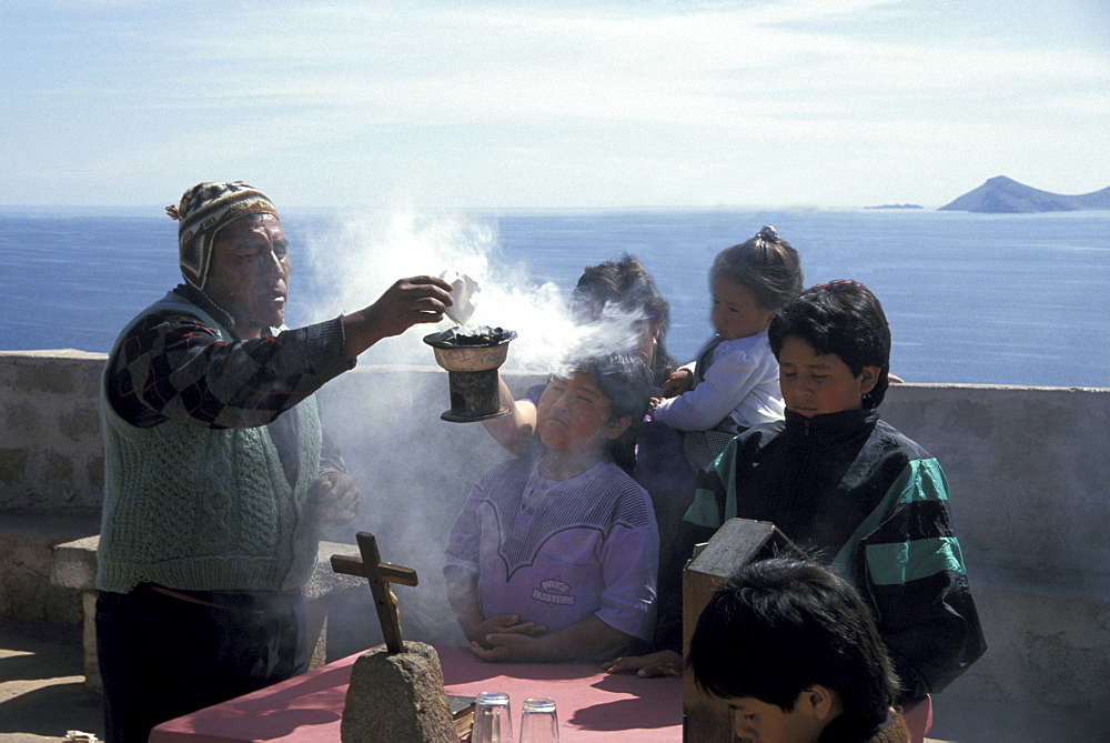 Bolivia catholic priest performing ceremony, copacabana