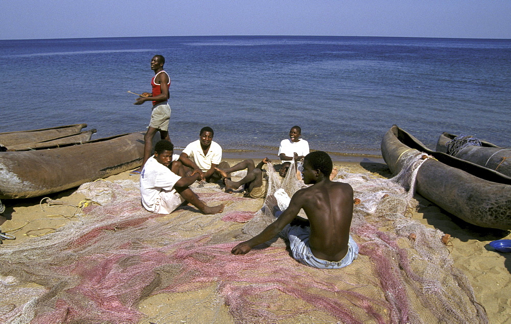 Mozambique fishermen of metangula on shores of nyasa