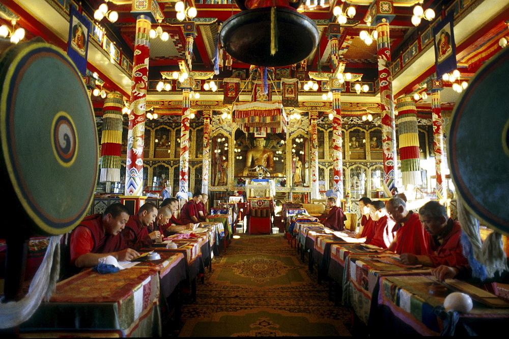 Russia - religion - buddhism lamaist monks performing ivolginsk monastery ude, buryatia