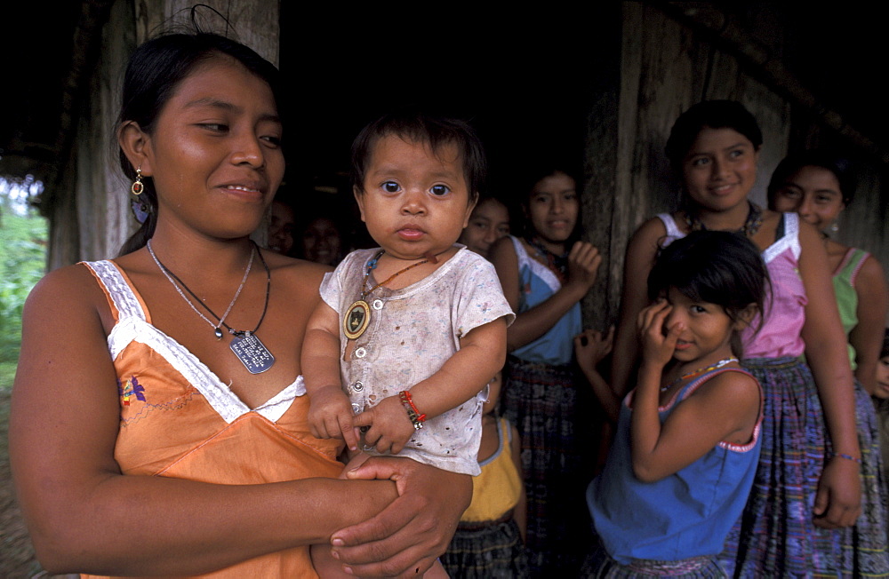 Guatemala qeqchi women and children at sechin village, peten