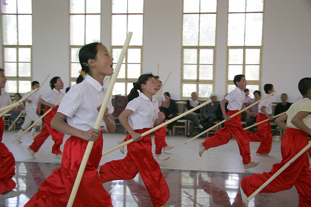 China children doing cereminial dance and acrobtics, ludung village, shaanxi.