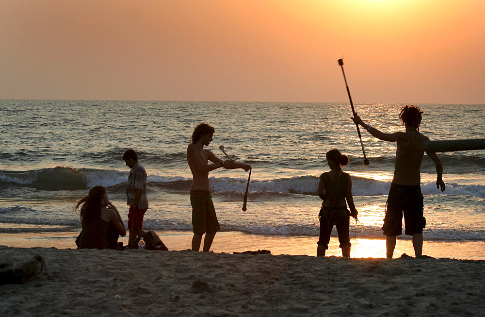 India israeli family on the beach at arambol, goa.