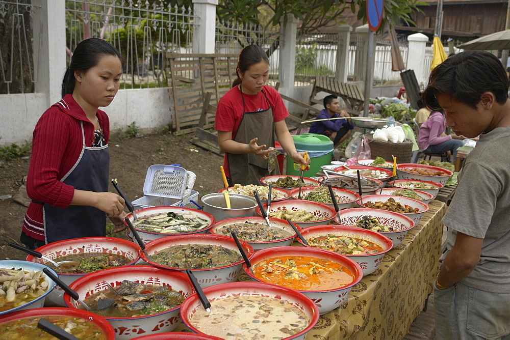 Laosready, to, eat food on sale in street market atluang prabang.